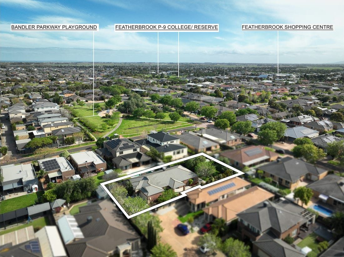 Aerial view showing nearby Bandler Parkway playground, Featherbrook P-9 College and Featherbrook Shopping Centre